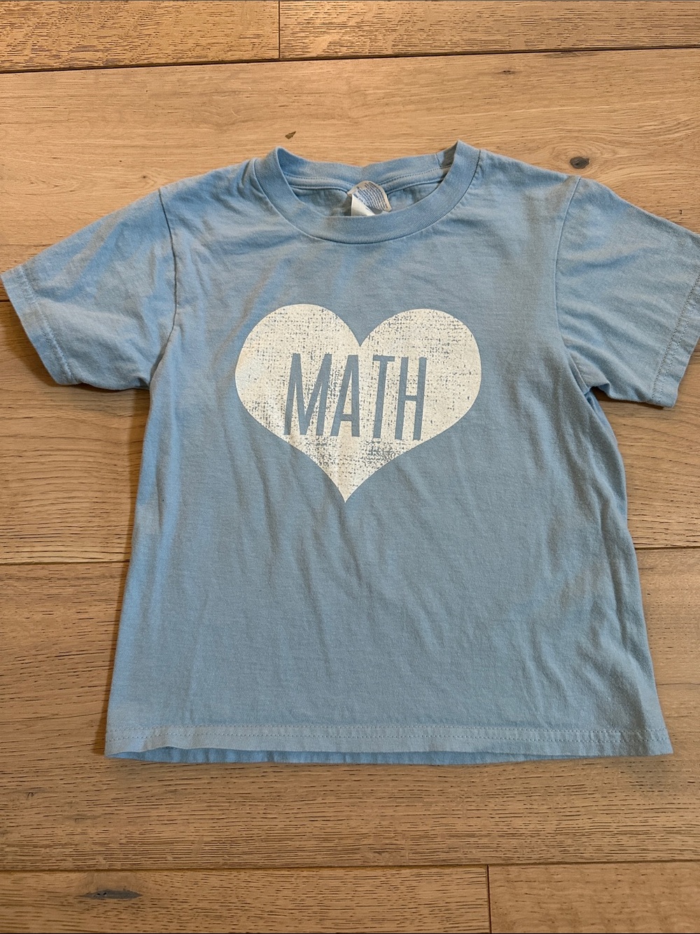 Amazon Light Blue Kids Tee with White Heart "MATH" Graphic